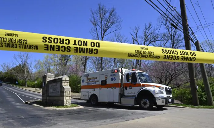 An ambulance leaves of Covenant School, Covenant Presbyterian Church, in Nashville, Tenn., on March 27, 2023. (John Amis/AP Photo)